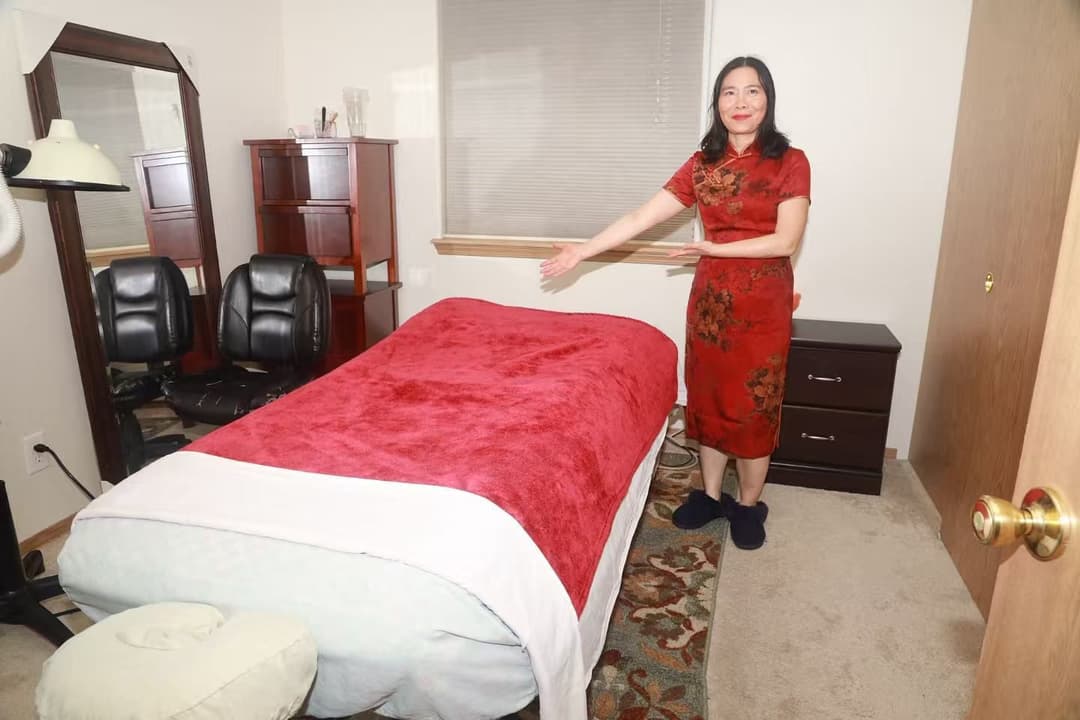 Private massage treatment room with heated table at Lily Massage Portland
